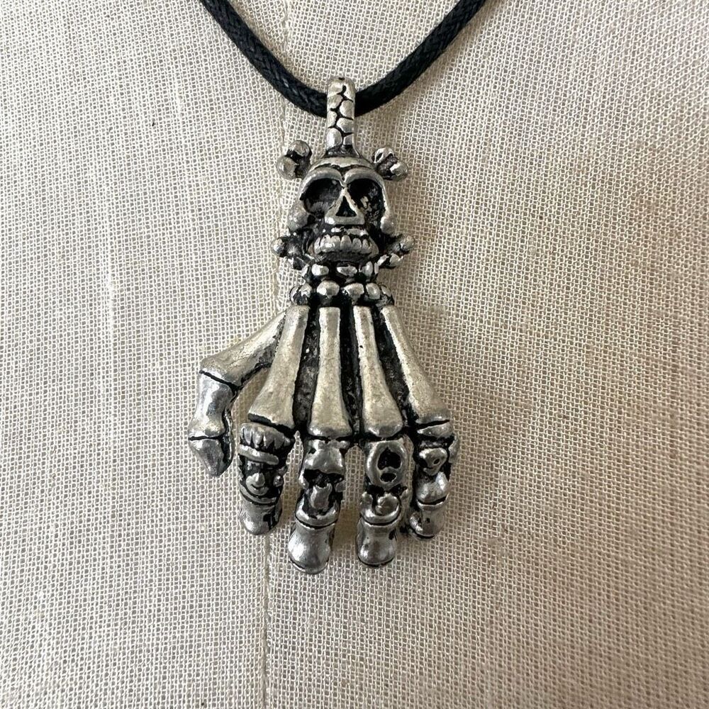 Skeleton claw silver tone pendant necklace